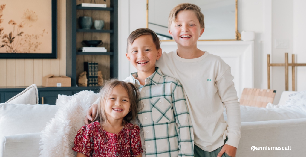 Content Creator @anniemescall kids smiling for a back to school photo.