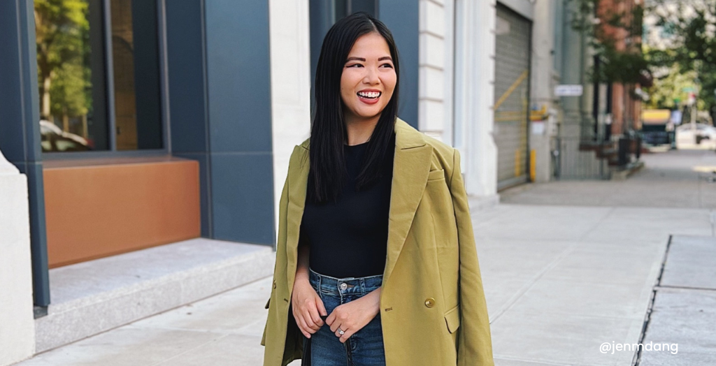 Content creator @jenmdang smiling for a holiday gifting guide photo