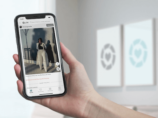 hand holding phone with LTK app